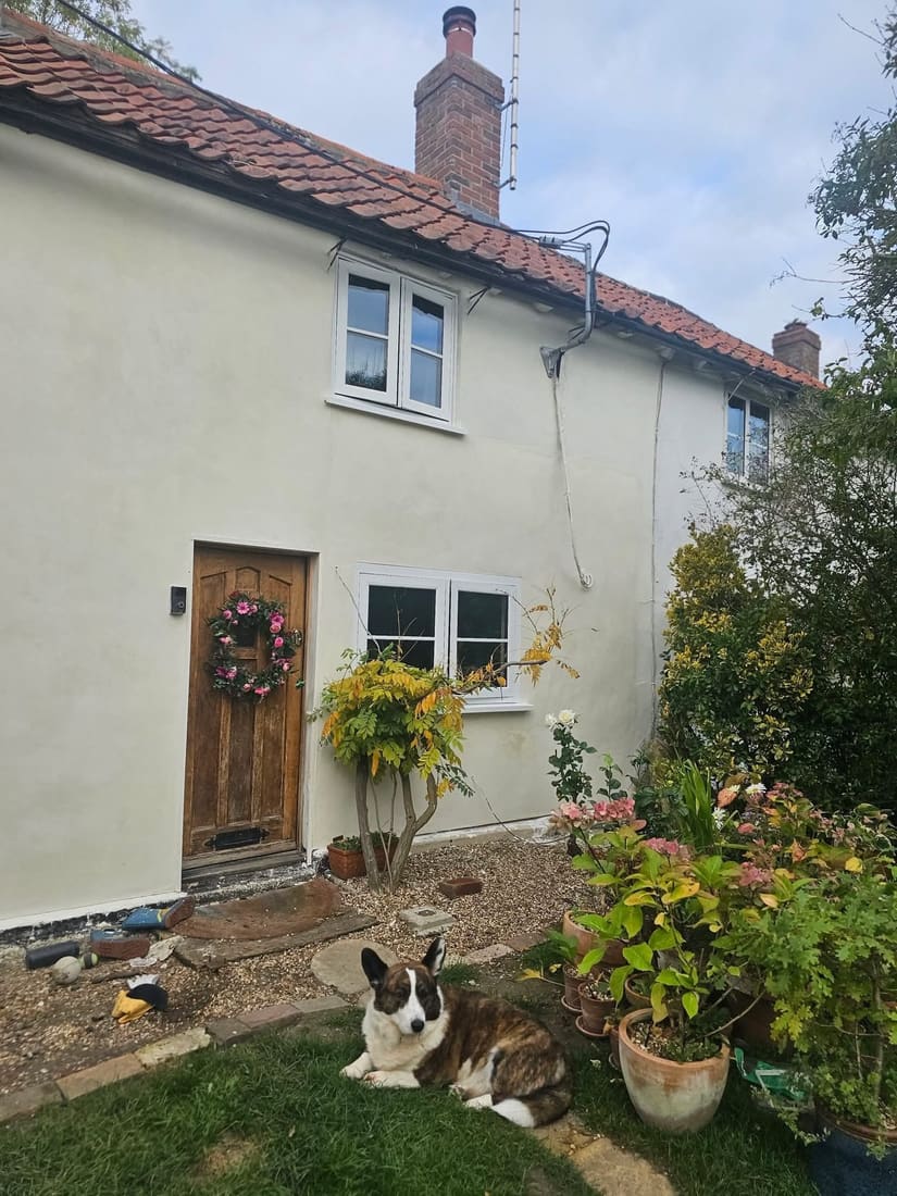 Breathable lime render on a period cottage in West Sussex